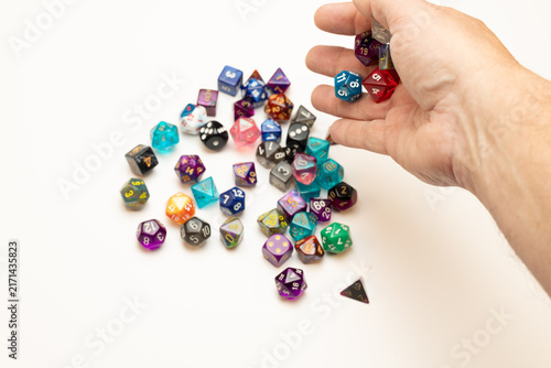 Fotografie Rolling polyhedral dice for tabletop games