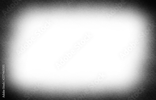 Black and white noise grain texture with soft vignette border and bright center, monochrome distressed film effect with subtle analog photographic grain