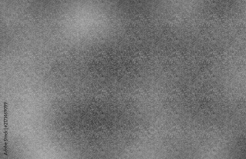 Grungy distressed noise grain texture overlay with rough monochrome surface, dusty speckles, analog film grain and weathered vintage texture
