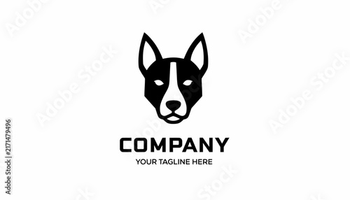 A minimalist black and white logo featuring a stylized dog head with pointed ears, above the text 