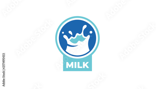 Blue circle badge featuring a white milk splash and the word milk written in bold white letters on a light background.