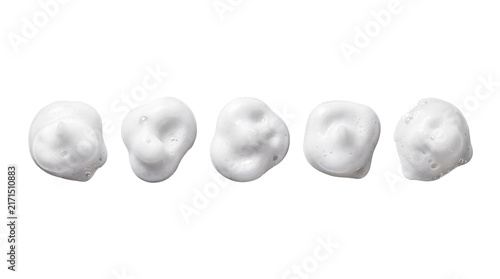 Realistic photograph of five white foamy soap bubbles, perfect for cosmetic, hygiene, and cleaning product advertising.