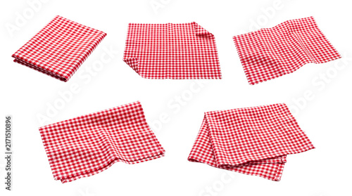 Collection of red and white checkered picnic cloths, folded and unfolded.