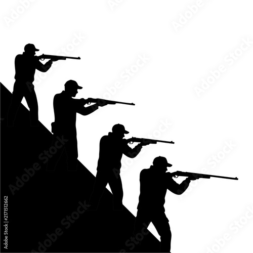 Silhouette of someone shooting with a long-barreled rifle.