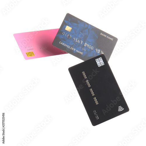 Flying different credit cards on white background