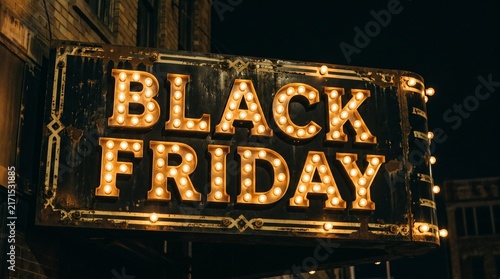Vintage Black Friday Marquee Sign Illuminated With Warm Lights At Night