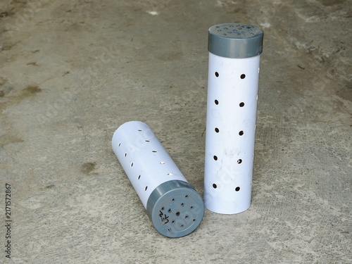 White plastic biopore infiltration tubes used for organic waste management and groundwater conservation.