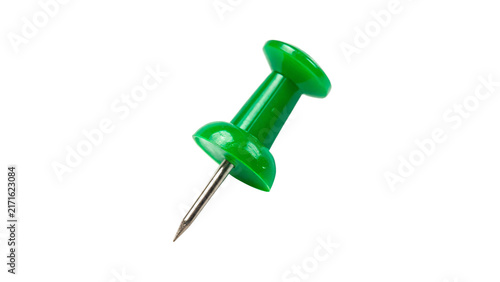 Green plastic push pin for notice boards isolated on a white background