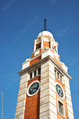 Tsim Sha Tsui Clock Tower in Hong Kong Against Clear Blue Sky
