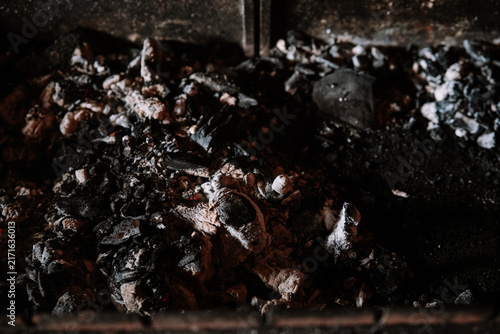 Konstfotografi Pile of ash and embers in a fireplace