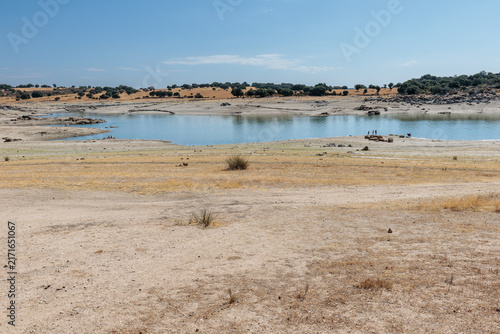 Almond Beach. Landscape with waters of the Almendra Reservoir, countryside and holm oaks, Zamora, Castile and León, Spain.