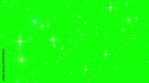 Sparkling star particles glow across a bright green chroma key background for video editing keying overlays.