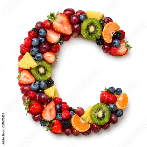 A vibrant mix of berries, kiwi, pineapple, citrus and grapes arranged into a colorful letter C on white.