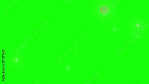 Glowing bokeh particles and soft light flares float against a vibrant green screen background for video overlay.
