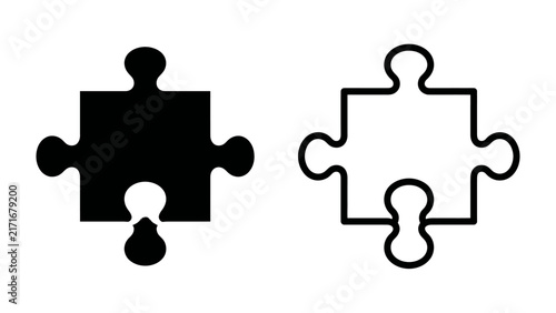 Bild auf Leinwand Puzzle Pieces: Two distinct puzzle pieces, one solid black and the other a clean white outline, symbolize connection, problem-solving, and the fundamental elements of a larger whole