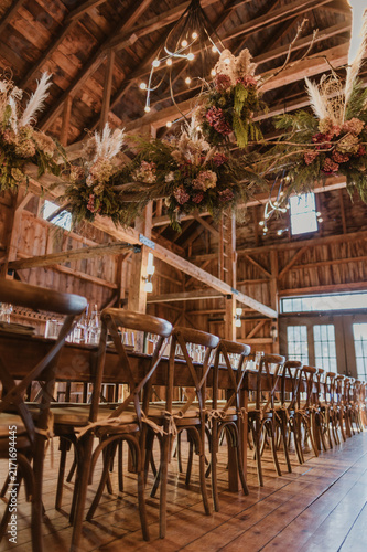 Fotografie Rustic barn wedding reception table and decor