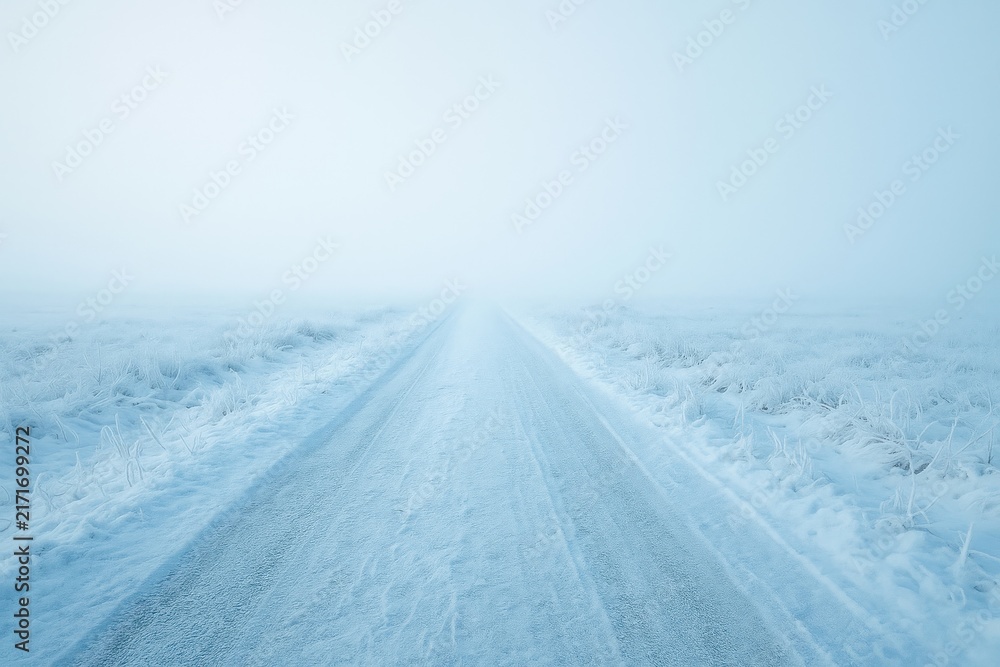 Fototapeta premium Serene winter road landscape.