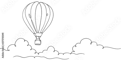 Hot air balloon flying above clouds line drawing