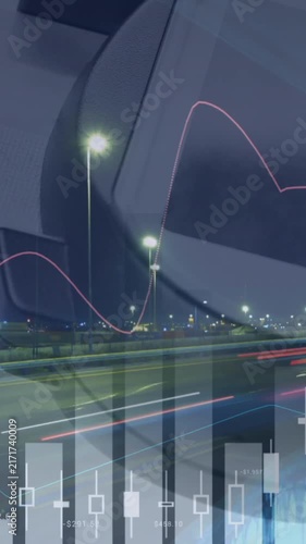 Animation of financial data over hand of man with payment terminal and timelapse of traffic