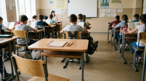 Students attending a lesson in a traditional classroom setting