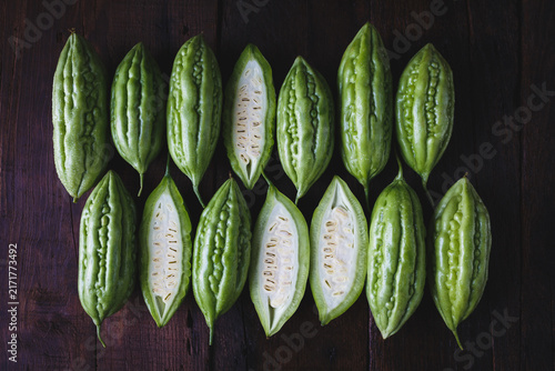 Konstfotografi Fresh bitter melons on the dark background