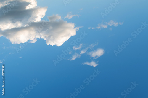 Summer morning blue sky with clouds, macro.