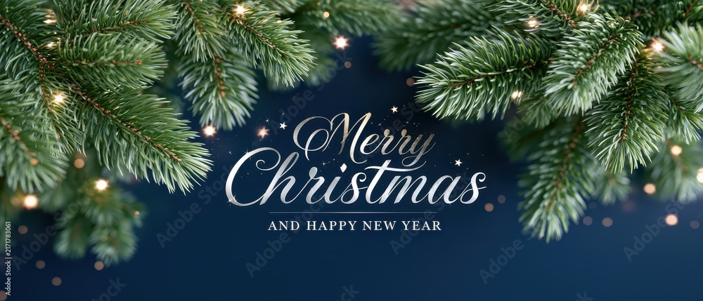 Obraz premium Elegant silver Merry Christmas and Happy New Year typography on dark navy blue background with pine branches and glowing fairy lights.