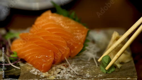 Canvastavla Fresh Salmon Sashimi with Wasabi and Chopsticks in Dubai