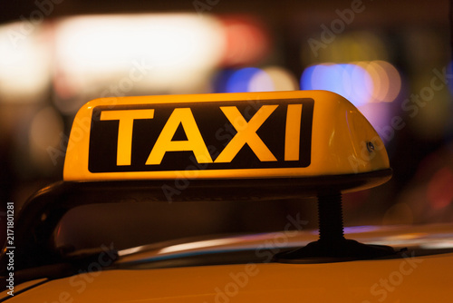 Germany, Bavaria, Munich, Illuminated sign on taxi showing availability
