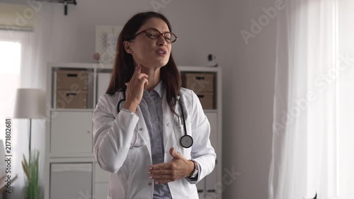 Professional female doctor explaining medical condition to patient