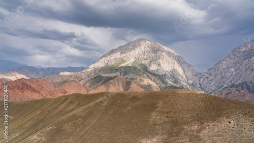 Colorful mountain landscape view in Gulcha valley on overcast summer afternoon, Osh, Kyrgyzstan