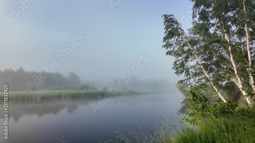 Early Summer Morning River Covered with Light Mist, Natural Scenic Background for Environment and Travel Content