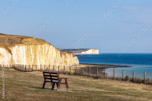 A bench with a view of the Sussex coastline, at Peacehaven