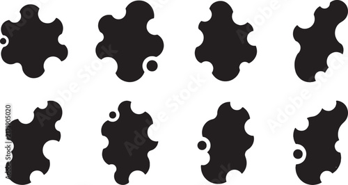 Solid black organic shapes with concave edges and smooth bite marks