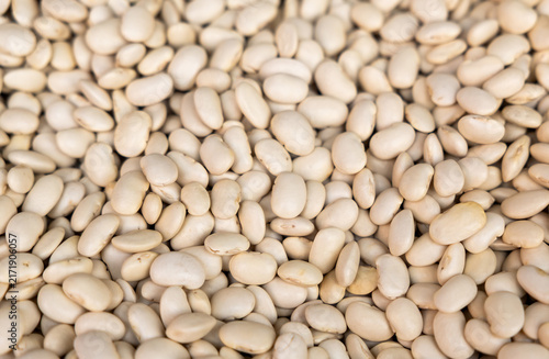 Full frame background of raw white navy beans