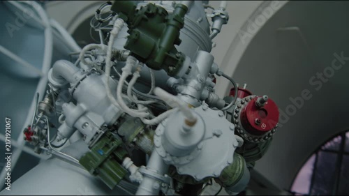 Vintage Rocket Engine with Pipes and Valves in Aerospace Museum