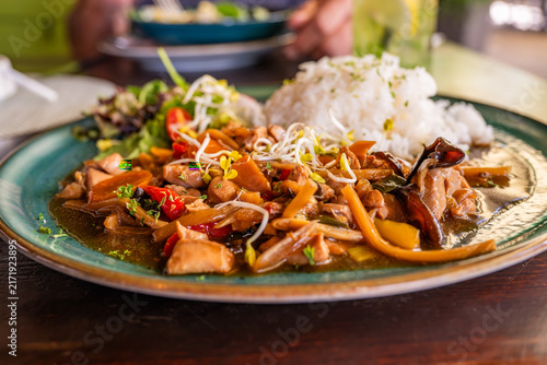 Konstfotografi Asian cuisine chicken piece with vegetable and soy sauce, boiled rice, eating