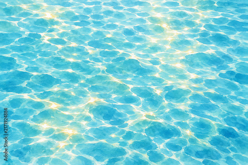 Bright turquoise water surface with sunlight reflections