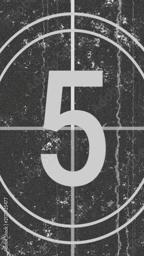 Vertical video, vintage countdown from 10 to 1, old film grunge texture, scratches, and dust effects