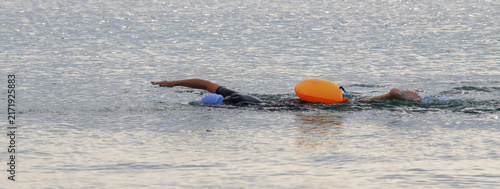 Women open water swimming in the atlantic ocean off Corolla Beach