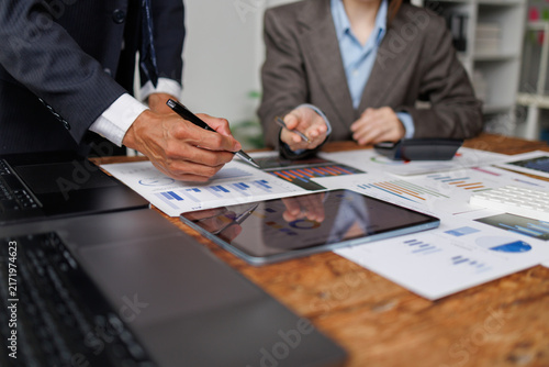 Cuadro en lienzo Business people meeting in office, analyzing financial data and marketing charts