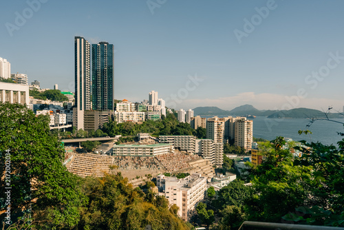 Fotografie Victoria Coast residential complex in Pok Fu Lam on Hong Kong Island, featuring modern high-rise residential architecture in a densely developed urban setting - 27 August 2026