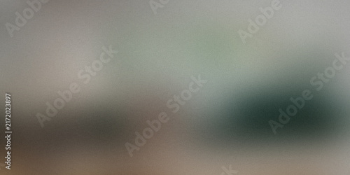Smooth hazy gradient background with soft transition between light gray and deep teal.
