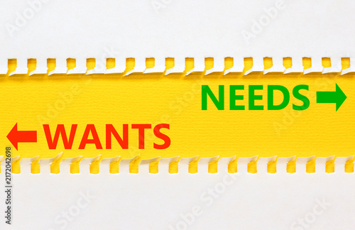 Фотография Needs instead wants words symbol
