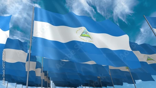 Multiple Nicaragua flags seamless looping waving on blue sky