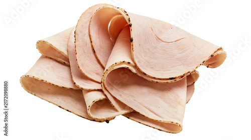 Konstfotografi Stack of thinly sliced deli turkey breast with pepper seasoning, isolated on tra