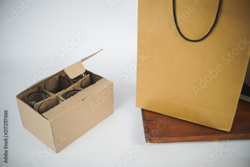 Kraft shopping bag and cardboard delivery boxes