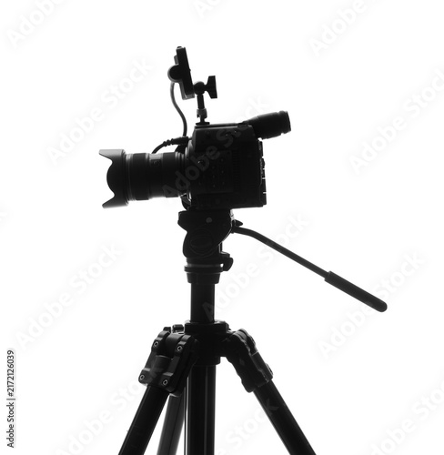 Silhouette of Professional Video Camera on Tripod Isolated on White