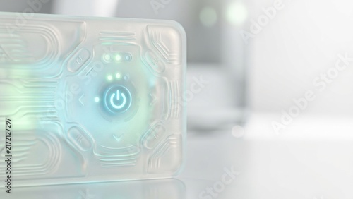 Futuristic translucent electronic device interface with glowing power button