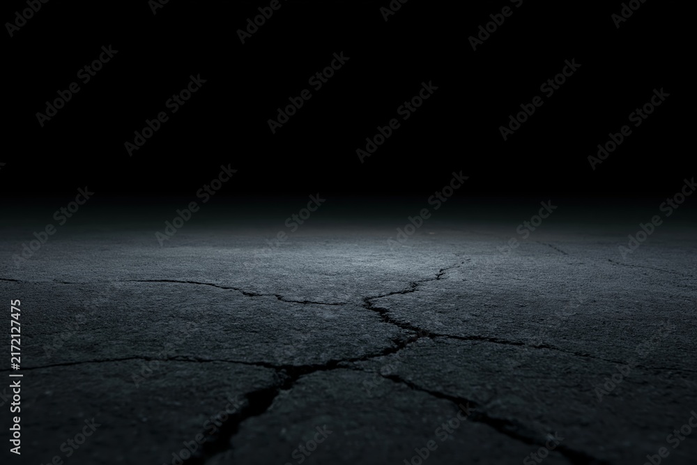 Naklejka premium The Cracked Ground Under a Dark Night Sky and Empty Horizon